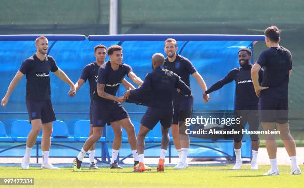 Players take part in a drill during an England training session during the 2018 FIFA World Cup Russia at Spartak Zelenogorsk Stadium on July 13, 2018...