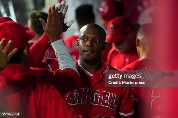 Justin Upton of the Los Angeles Angels of Anaheim celebrates during the MLB game against the Seattle Mariners at Angel Stadium on July 12, 2018 in...
