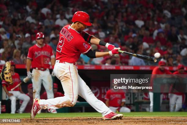 Andrelton Simmons of the Los Angeles Angels of Anaheim at bat during the MLB game against the Seattle Mariners at Angel Stadium on July 12, 2018 in...