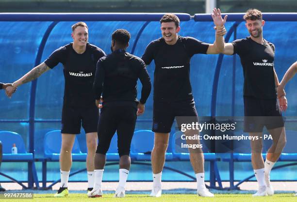 England's Phil Jones, Danny Rose, Harry Maguire and Gary Cahill during the training session at the Spartak Zelenogorsk Stadium.