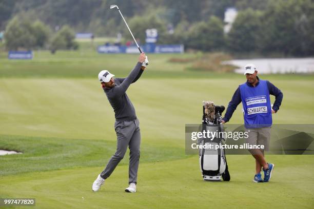 Charl Schwartzel of South Africa in action in the first round of the men's single competition at the European Tour PGA Championship in Winsen an der...
