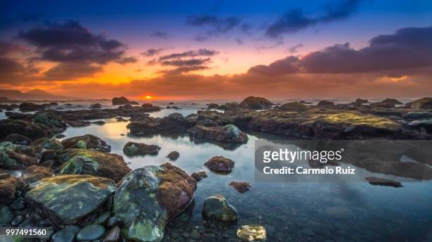 coastal sunset - carmelo fotografías e imágenes de stock