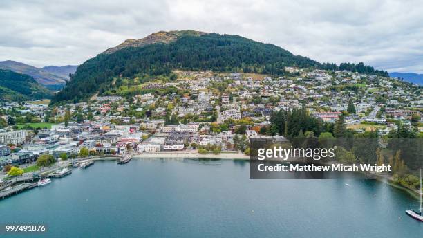 views over new zealand's beautiful city of queenstown and lake wakatipu. - micah stock pictures, royalty-free photos & images
