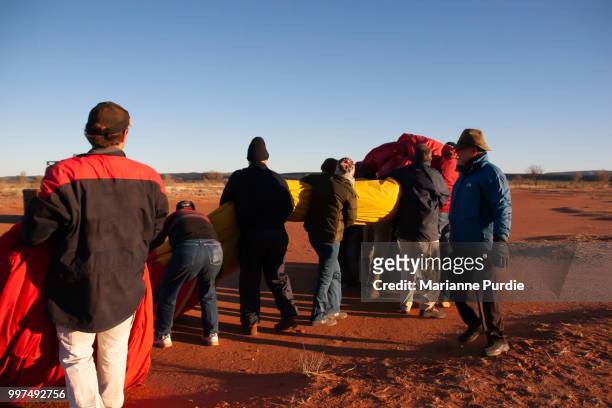 packing up a hot air balloon - fun northern territory stock pictures, royalty-free photos & images