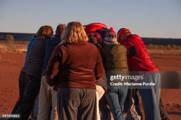 packing up a hot air balloon - fun northern territory stock pictures, royalty-free photos & images