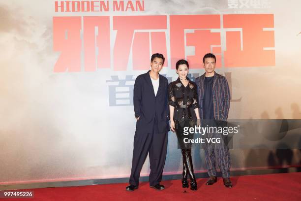 Actor Eddie Peng Yu-yen, actress Xu Qing and actor Liao Fan attend the premiere of director Jiang Wen's movie 'Hidden Man' at Beijing Wtown on July...