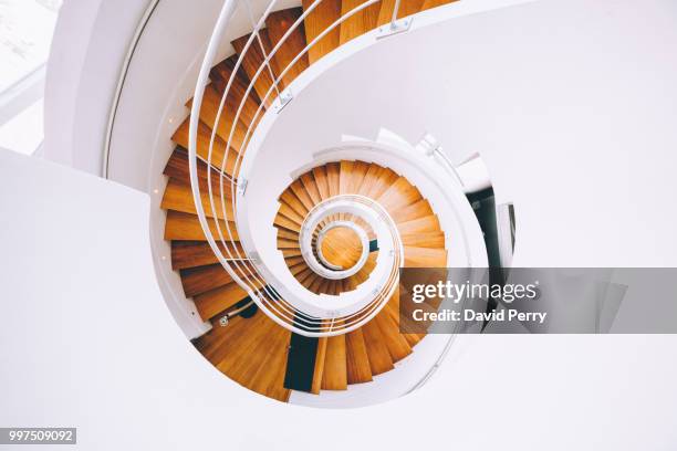 out of control - spiral staircase fotografías e imágenes de stock