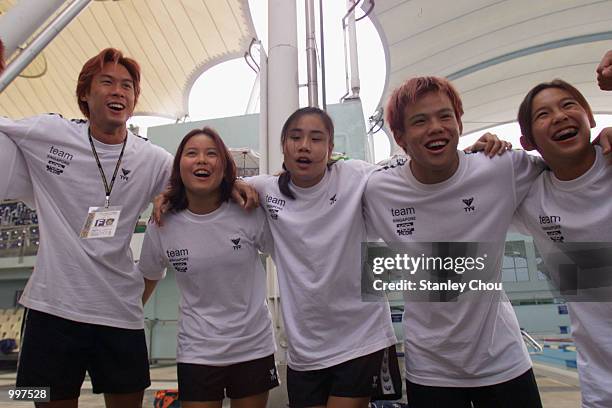 The Singapore Swimming Team demonstrates high spirit before the start of their training session being held at the Bukit Jalil Aquatics Centre, Kuala...