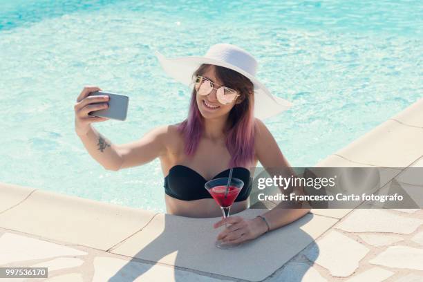 summer by the pool - poolside glamour stock pictures, royalty-free photos & images