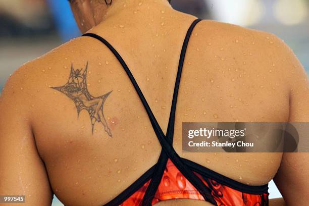 Joscelin Yeo of Singapore spots a Tattoo at her back during a training session held at the Bukit Jalil Aquatics Centre, Kuala Lumpur, Malaysia ahead...