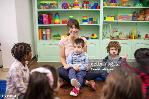 story telling time in preschool - narrating stock pictures, royalty-free photos & images