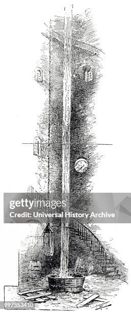 Engraving depicting the process of making lead shots: interior of the shot tower near Waterloo Bridge, London, showing how the molten lead was...