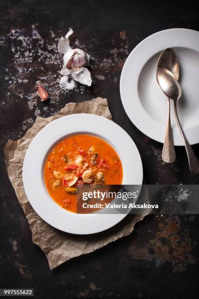 homemade seafood soup with tomato sauce and coconut milk on an old metal tray, top view - coconut milk soup stock pictures, royalty-free photos & images