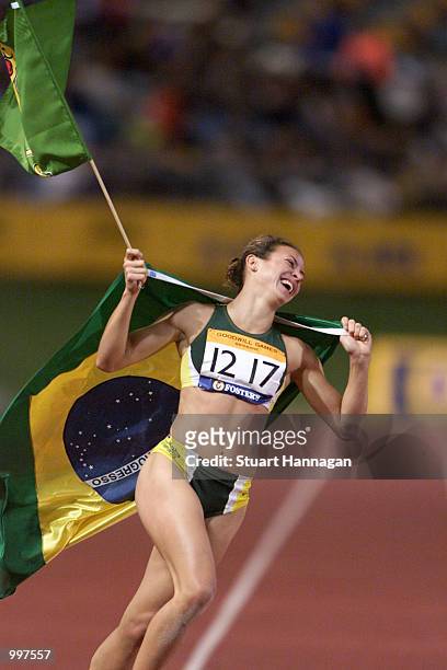 Maurren Higa Maggi of Brazil celebrates winning the Womens Long Jump during the athletics at the ANZ Stadium during the Goodwill Games in Brisbane,...