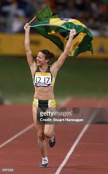 Maurren Higa Maggi of Brazil celebrates winning the Womens Long Jump during the athletics at the ANZ Stadium during the Goodwill Games in Brisbane,...