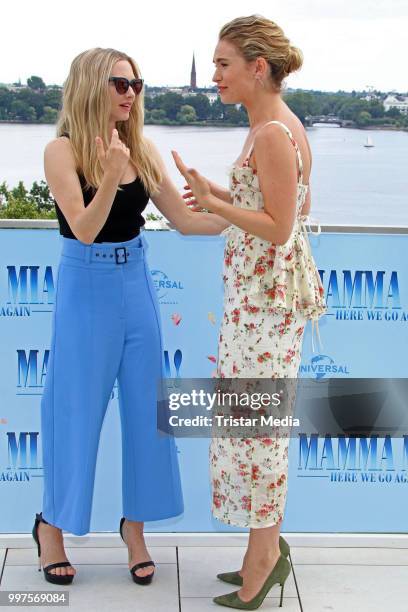 Amanda Seyfried and Lily James during the Mamma Mia! Here we go again' Musical Photo Call on July 12, 2018 in Hamburg, Germany.