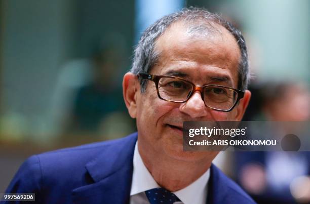 Italian Finance Minister Giovanni Tria looks on during an Economic and Financial Affairs Council Finance Ministers meeting in Brussels on July 13,...