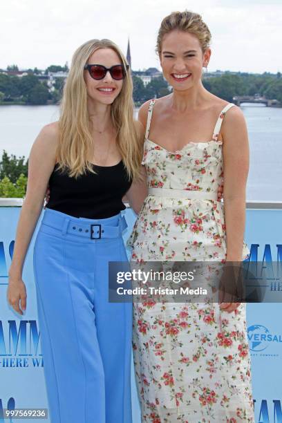 Amanda Seyfried and Lily James during the Mamma Mia! Here we go again' Musical Photo Call on July 12, 2018 in Hamburg, Germany.