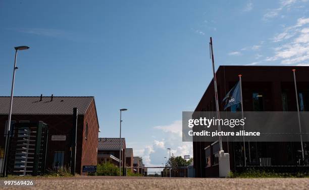 July 2018, Netherlands, Ter Apel: The entrance area at the main reception centre for asylum seekers 'VluchtelingenWerk Noord-Nederland...