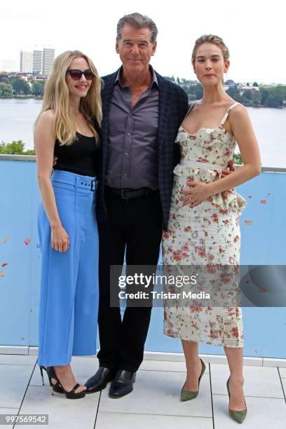 Amanda Seyfried, Pierce Brosnan and Lily James during the Mamma Mia! Here we go again' Musical Photo Call on July 12, 2018 in Hamburg, Germany.