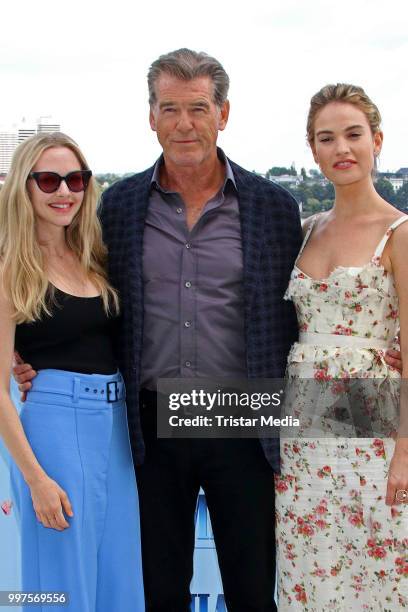 Amanda Seyfried, Pierce Brosnan and Lily James during the Mamma Mia! Here we go again' Musical Photo Call on July 12, 2018 in Hamburg, Germany.