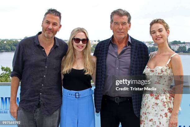 Ol Parker, Amanda Seyfried, Pierce Brosnan and Lily James during the Mamma Mia! Here we go again' Musical Photo Call on July 12, 2018 in Hamburg,...