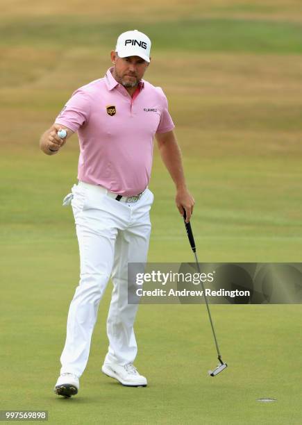 Lee Westwood of England reacts to a birdie putt on hole five during day two of the Aberdeen Standard Investments Scottish Open at Gullane Golf Course...