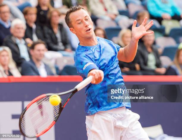 Philipp Kohlschreiber of Germany playing against G. Simon of France in the men's singles at the Tennis ATP-Tour German Open in Hamburg, Germany, 25...