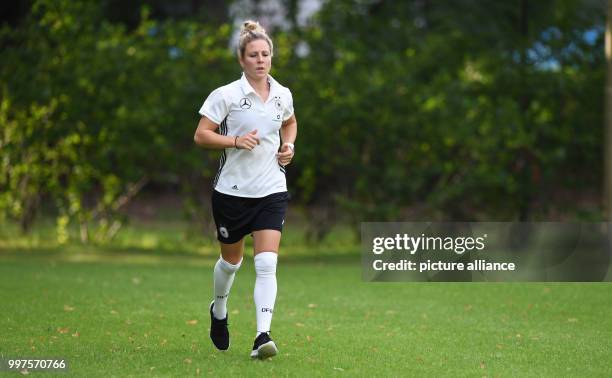 Injured Germany player Svenja Huth running during a Germany training session near Sint-Michielsgestel, the Netherlands, 27 July 2017. Photo: Carmen...