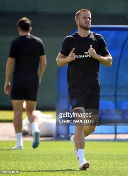 England's midfielder Eric Dier runs during a training session in Repino near Saint Petersburg on July 13, 2018 on the eve of the Russia 2018 World...