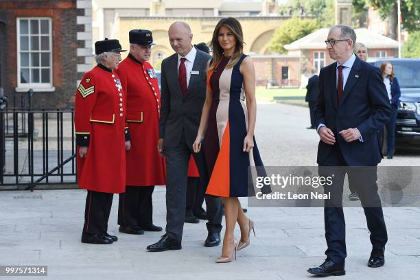 First Lady, Melania Trump, accompanied by Philip May , is greeted by Royal Hospital CEO Gary Lashko, as she arrives to meet British Army veterans,...