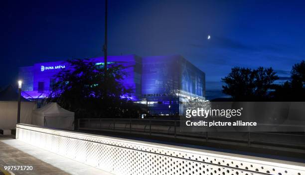 The Duna Arena, where the competitions for diving and in-door swimming are taking place, can be seen illuminated in blue during the FINA World...