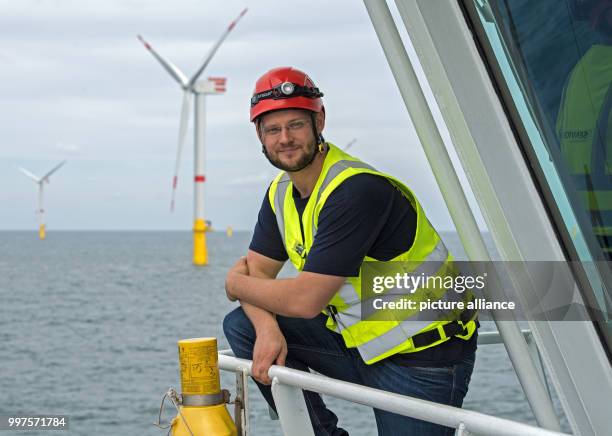 The Commissioning Site Managerof the offshore wind park "Nordsee 1", Alexander Wruck, in front of the East Frisian island Spiekeroog, Germany, 27...