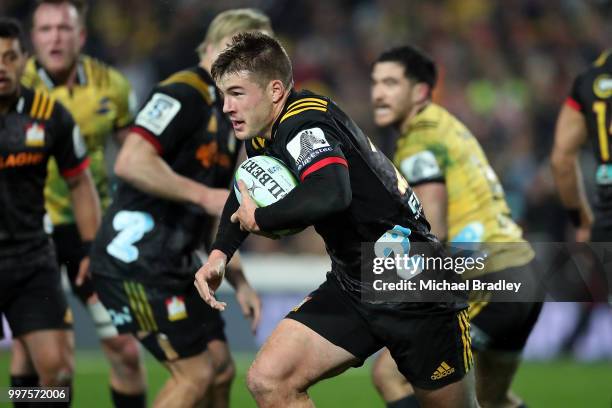 Chiefs Alex Nankivell makes a break during the round 19 Super Rugby match between the Chiefs and the Hurricanes at Waikato Stadium on July 13, 2018...