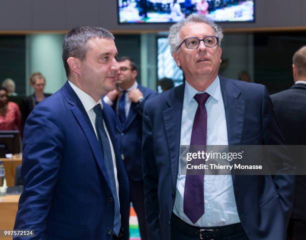 Bulgarian Finance Minister Vladislav Goranov is talking with the Luxembourg Minister of Finance, Treasury, & Budget Pierre Gramegna during an EU...