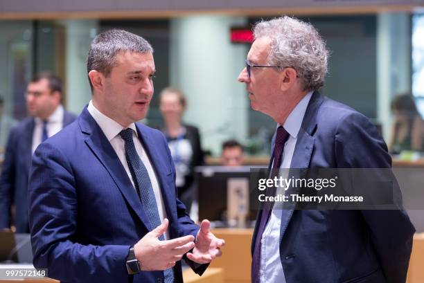 Bulgarian Finance Minister Vladislav Goranov is talking with the Luxembourg Minister of Finance, Treasury, & Budget Pierre Gramegna during an EU...