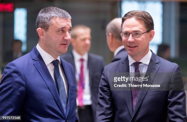 Bulgarian Finance Minister Vladislav Goranov is talking with the EU Jobs, Growth, Investment and Competitiveness Commissioner Jyrki Katainen during...
