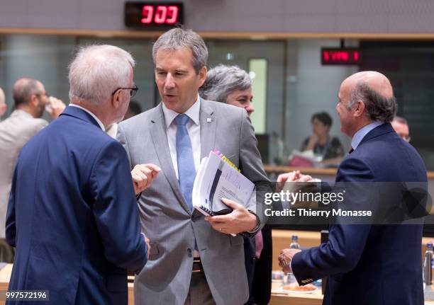 From Left: President of the European Investment Bank Werner Hoyer is talking with the Austrian Finance Minister, President of the Council Hartwig...