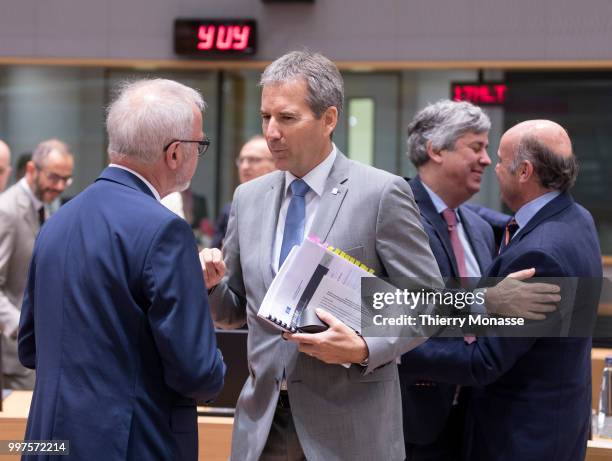 From Left: President of the European Investment Bank Werner Hoyer is talking with the Austrian Finance Minister, President of the Council Hartwig...