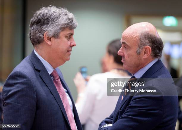 Portuguese Finance Minister Mario Centeno is talking with the Vice President of the European Central Bank Luis de Guindos Jurado during an EU EcoFin...