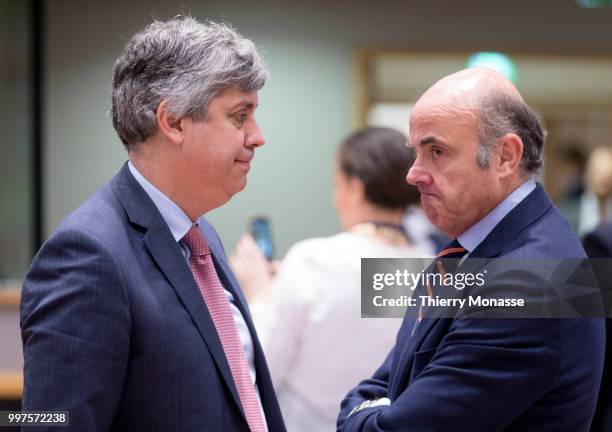 Portuguese Finance Minister Mario Centeno is talking with the Vice President of the European Central Bank Luis de Guindos Jurado during an EU EcoFin...