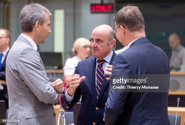 Austrian Finance Minister, President of the Council Hartwig Loeger is talking with the Vice President of the European Central Bank Luis de Guindos...
