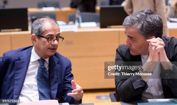 Italian Minister Economy & Finance Giovanni Tria is talking with the Greek Finance Minister Euclid Tsakalotos during an EU EcoFin Ministers meeting...