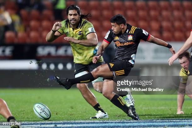 Chiefs Te Toiroa Tahuriorangi clears the ball during the round 19 Super Rugby match between the Chiefs and the Hurricanes at Waikato Stadium on July...