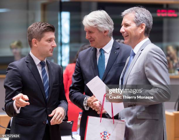 Croatian Minister of Finance Zdravko Maric is talking with the Austrian Finance Minister, President of the Council Hartwig Loeger during an EU EcoFin...