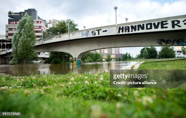 The river Ihme has risen in water level in front of the Ihme Centre in Hanover, Germany, 28 July 2017. Continuous rainfall has caused significant...