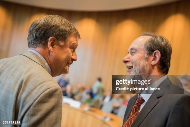 The head of the state election Wolfgang Schellen and the lawyer Christian Bill of the party AfD greet one another at the state parliament in...