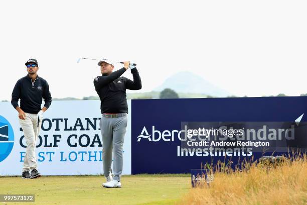 Tyrrell Hatton of England takes his tee shot on hole eight during day two of the Aberdeen Standard Investments Scottish Open at Gullane Golf Course...