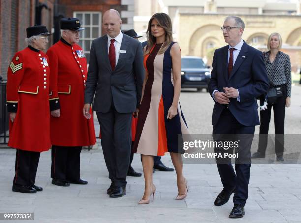 First Lady Melania Trump, is accompanied by Philip May, the husband of British Prime Minister Theresa May as she meets British military veterans...