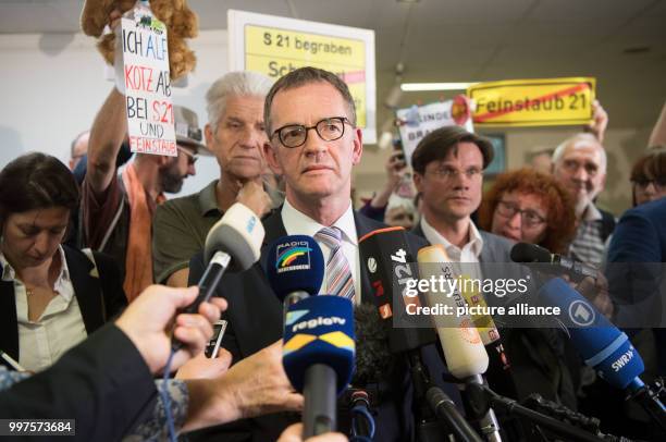 Edgar Neumann, speaker of the ministry of transport Baden-Wuerttemberg gives interviews after the sentencing at the District Court in Stuttgart,...